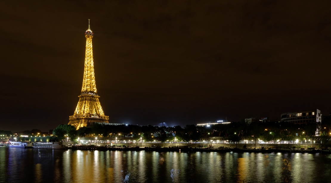 Lamp Lighting At The Foot Of Eiffel Tower In Paris Lamp Lighting At The Foot Of Eiffel